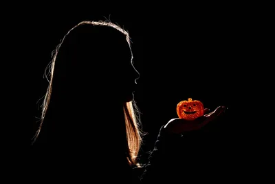 Silhouetted Woman Holding Glowing Jack-O'-Lantern - free people & portraits wallpaper 6000×4000