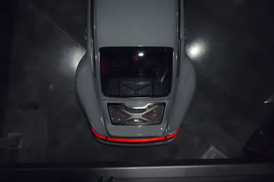 Silver Sports Car Top-Down View in Dark Garage - free cars & vehicles wallpaper 2048×1365