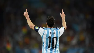 Messi's Triumphant Moment in Blue and White - free sports wallpaper 5120×2880