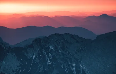 Crimson Dusk Over Layered Mountain Peaks - free nature wallpaper 6000×3862