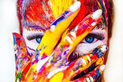 Vibrant Artist: Colorful Paint Portrait with Blue Eyes - free photography wallpaper 4896×3264