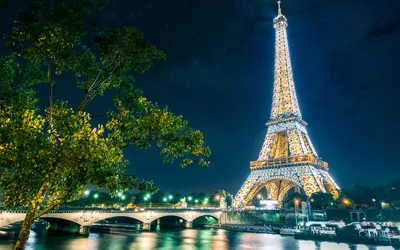 Eiffel Tower Glowing Under Starry Paris Nights - free city & urban wallpaper 6016×3760