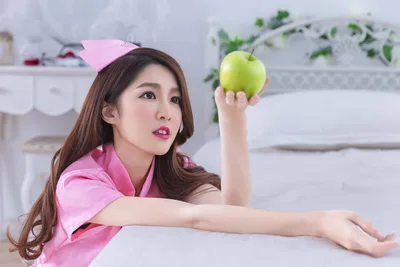 Nurse's Fresh Apple Moment in Bedroom - free people & portraits wallpaper 5120×3413