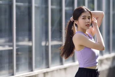 Urban Fitness Portrait: Woman Tying Hair - free people & portraits wallpaper 4783×3189