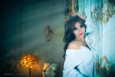 Woman in White Leaning Against Ornate Turquoise Wall - free people & portraits wallpaper 5760×3840
