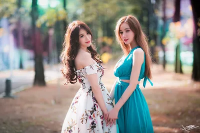 Two Women in Floral and Blue Dresses in Park - free people & portraits wallpaper 5760×3840