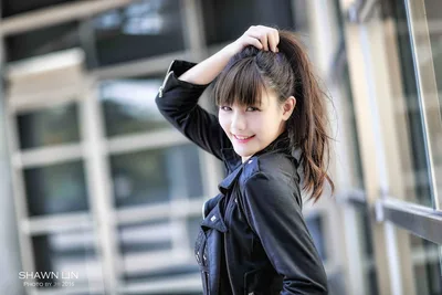Young Woman in Black Jacket by Modern Building - free people & portraits wallpaper 5760×3840