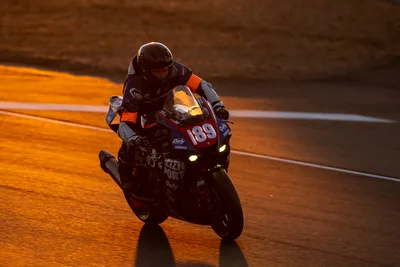 Motorcycle Racer Number 89 on Night Circuit Track - free sports wallpaper 4948×3299