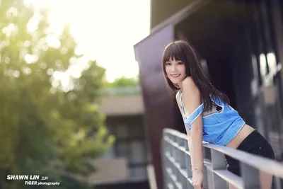 Young Woman Posing on Balcony in Blue Top - free people & portraits wallpaper 5760×3840
