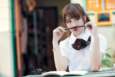 Student Girl in School Uniform Reading with Pen - free people & portraits wallpaper 5760×3840