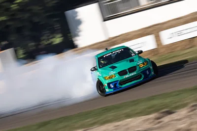 Turquoise BMW Drifting with Smoke Trail - free cars & vehicles wallpaper 6136×4093