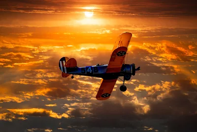 Vintage Red and Blue Biplane Flying at Sunset - free cars & vehicles wallpaper 3840×2560