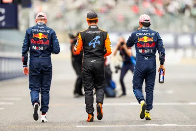 Three Formula 1 Drivers Walking on Track After Race - free people & portraits wallpaper 5472×3648