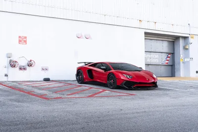Red Lamborghini Supercar in Industrial Parking Lot - free cars & vehicles wallpaper 9504×6336