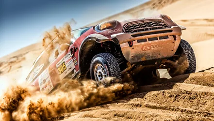 Rally Car Kicking Up Dust in Desert Terrain - free cars & vehicles wallpaper 5472×3100