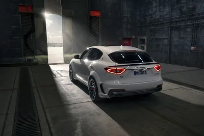 White Maserati Sports Car in Industrial Garage - free cars & vehicles wallpaper 4500×3002