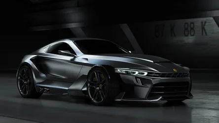 Sleek Silver Sports Car in Dark Garage Setting - free cars & vehicles wallpaper 1920×1080