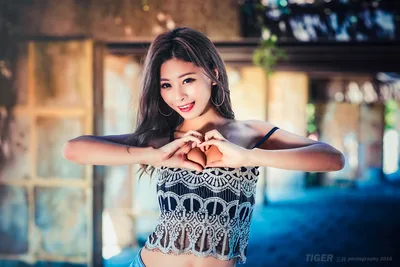 Woman Making Heart Hand Gesture Outdoors - free people & portraits wallpaper 5760×3840