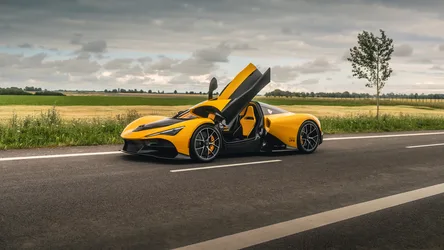 Zenvo Aurora Tur Hypercar on Open Tarmac Road - free cars & vehicles wallpaper 7680×4320
