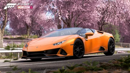Orange Lamborghini Beneath Cherry Blossoms - free gaming wallpaper 3840×2160