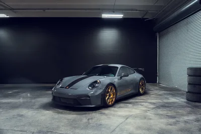 Sports Car and Car by a Window - free wallpaper 2048×1365