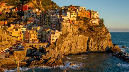 Colorful Cliffside Village at Golden Hour - free city & urban wallpaper 3840×2160