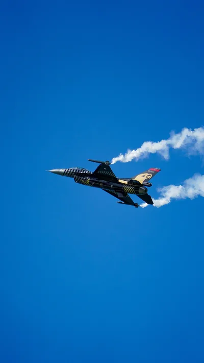 Military Jet in Dynamic Flight Against Blue Sky - free cars & vehicles wallpaper 3376×6000