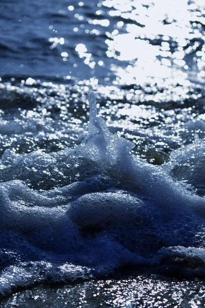 Ocean Waves Crashing on Rocks in Blue Light - free minimalist wallpaper 2561×3840
