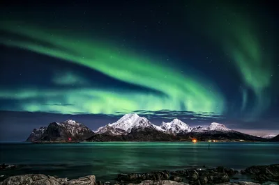 Northern Lights Dance Over Snowy Mountain Peak - free gaming wallpaper 4671×3109