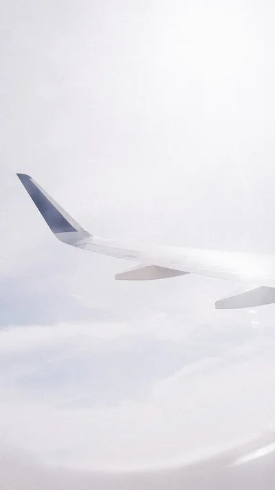 Airplane Wing Above the Clouds - free landscapes wallpaper 800×1422