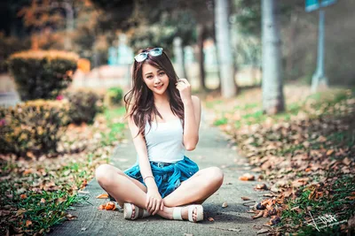 Young Woman Sitting on Path in Casual Summer Outfit - free wallpaper 5760×3840