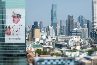 Thai Royal Portrait with Bangkok Skyline - free city & urban wallpaper 5568×3712
