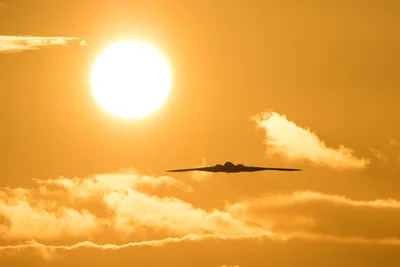 Military Aircraft Silhouette Against Golden Sunset Sky - free cars & vehicles wallpaper 5472×3648
