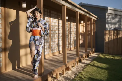 Woman in Traditional Japanese Kimono on Wooden Veranda - free wallpaper 6144×4096