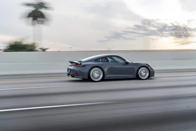 Gray Porsche 911 Driving On Highway - free wallpaper 9504×6336