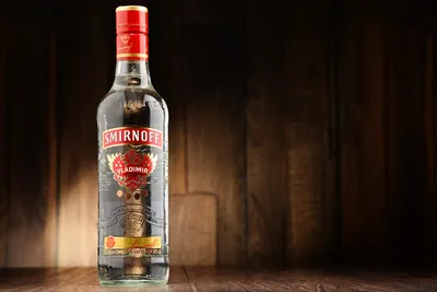 Smirnoff Vodka Bottle on Wooden Surface - free food wallpaper 6016×4016