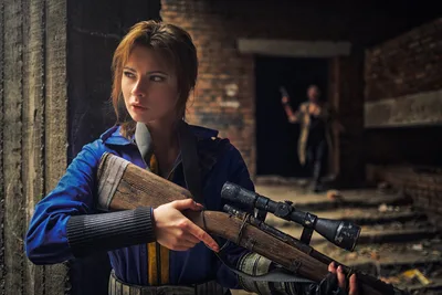 Woman With Scoped Rifle in Industrial Setting - free wallpaper 2048×1365