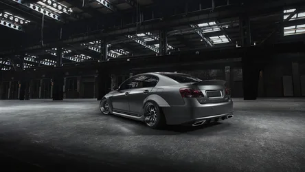 Silver Sports Sedan in Industrial Warehouse Setting - free wallpaper 1920×1080