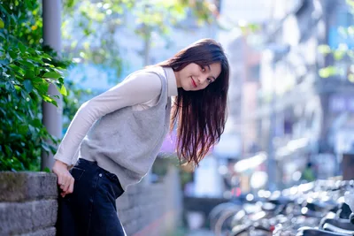 Young Woman Posing on Urban Street with Ivy - free people & portraits wallpaper 4562×3041