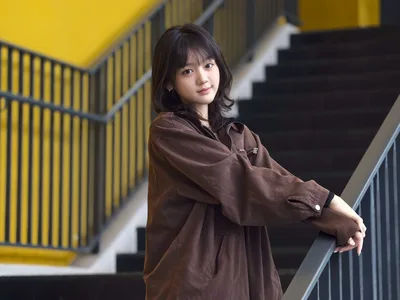 Young Woman in Brown Jacket on Modern Staircase - free people & portraits wallpaper 6144×4608