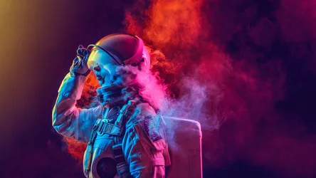 Neon Astronaut in Colorful Smoke and Light - free wallpaper 1920×1080