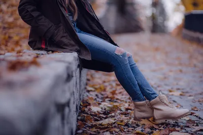 Person Sitting on Concrete Edge in Autumn - free wallpaper 5472×3648