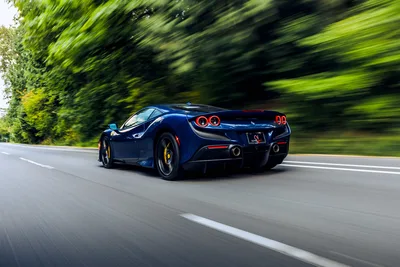 Blue Sports Car Racing On Highway With Green Trees - free wallpaper 6261×4174