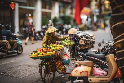 Street Vendor With Fruit Cart In Vietnamese Market - free city & urban wallpaper 2048×1365