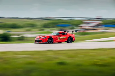 Red Sports Car Racing On Track With Motion Blur - free cars & vehicles wallpaper 6720×4480