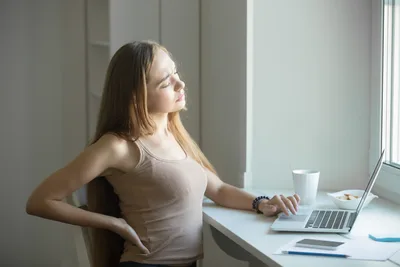 Pregnant Woman At Desk Experiencing Back Pain - free people & portraits wallpaper 5451×3634