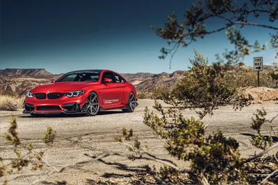 Red BMW M4 Sports Car in Desert Landscape - free cars & vehicles wallpaper 7297×4873