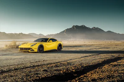 Yellow Ferrari Sports Car in Desert Landscape - free cars & vehicles wallpaper 7309×4880