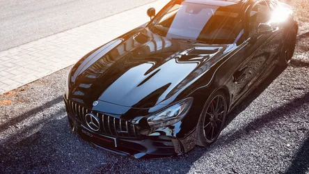 Black Mercedes-AMG Sports Car with Racing Stripes - free cars & vehicles wallpaper 4096×2304