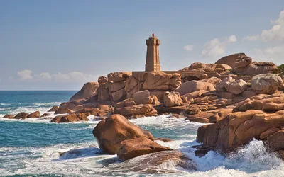Lighthouse on Rocky Granite Coastline by Ocean Waves - free landscapes wallpaper 6128×3830